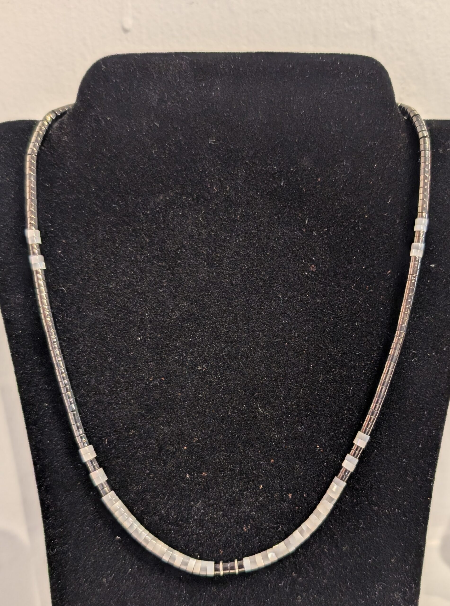 "Bottom white and blackNecklace" by Calvin and Pilar Lovato