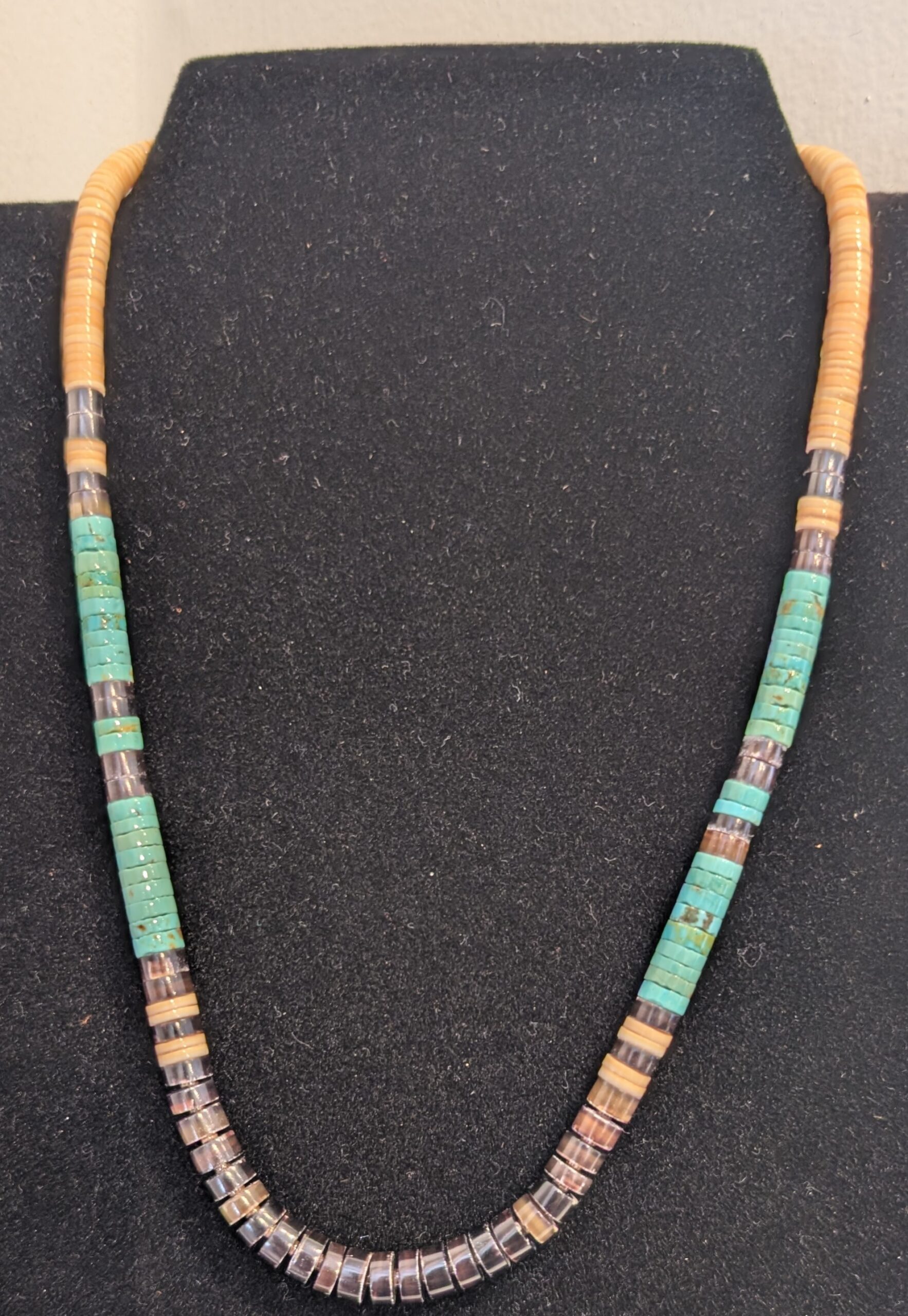 "Melon Shell Turquoise Sterling Heishi Necklace" by Calvin and Pilar Lovato