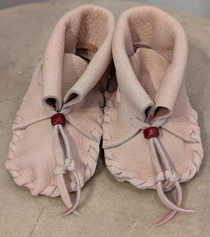 "Baby Moccasins Red" by Tara Lavelle